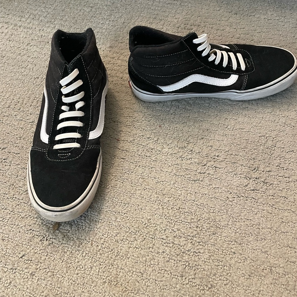 Black and White High-Top Vans Sneakers
